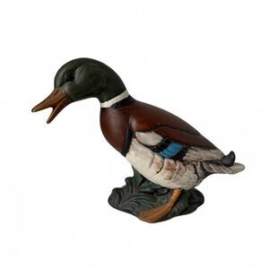 Vintage Hand-painted ceramic mallard duck figurine on a decorative base.